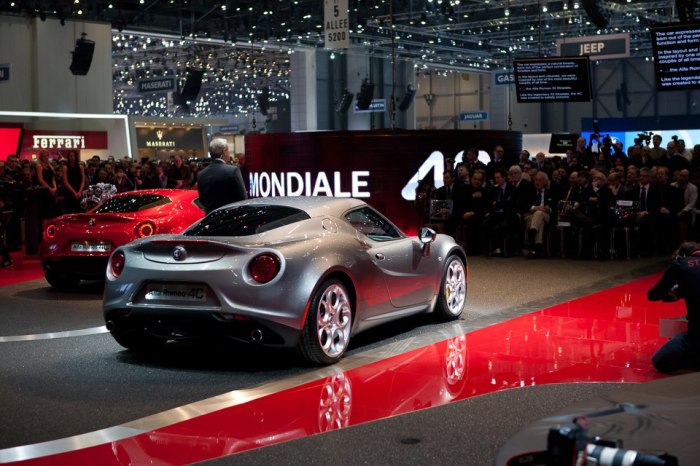 Harald Wester, head of Alfa Romeo, shows the 2 awesome Alfa Romeo 4C