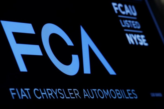 FILE PHOTO: A screen displays the ticker information for Fiat Chrysler Automobiles NV at the post where it's traded on the floorof the NYSE